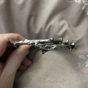 Gold colored bracelet (branch style)